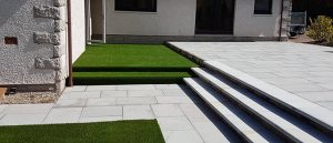 white pave stones fake grass